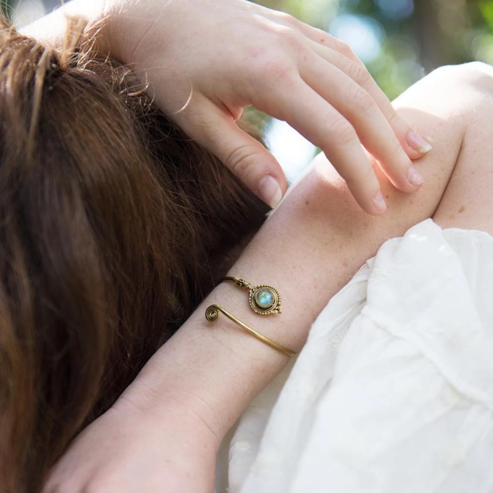 Woman wearing a Daya crystal bracelet on her wrist
