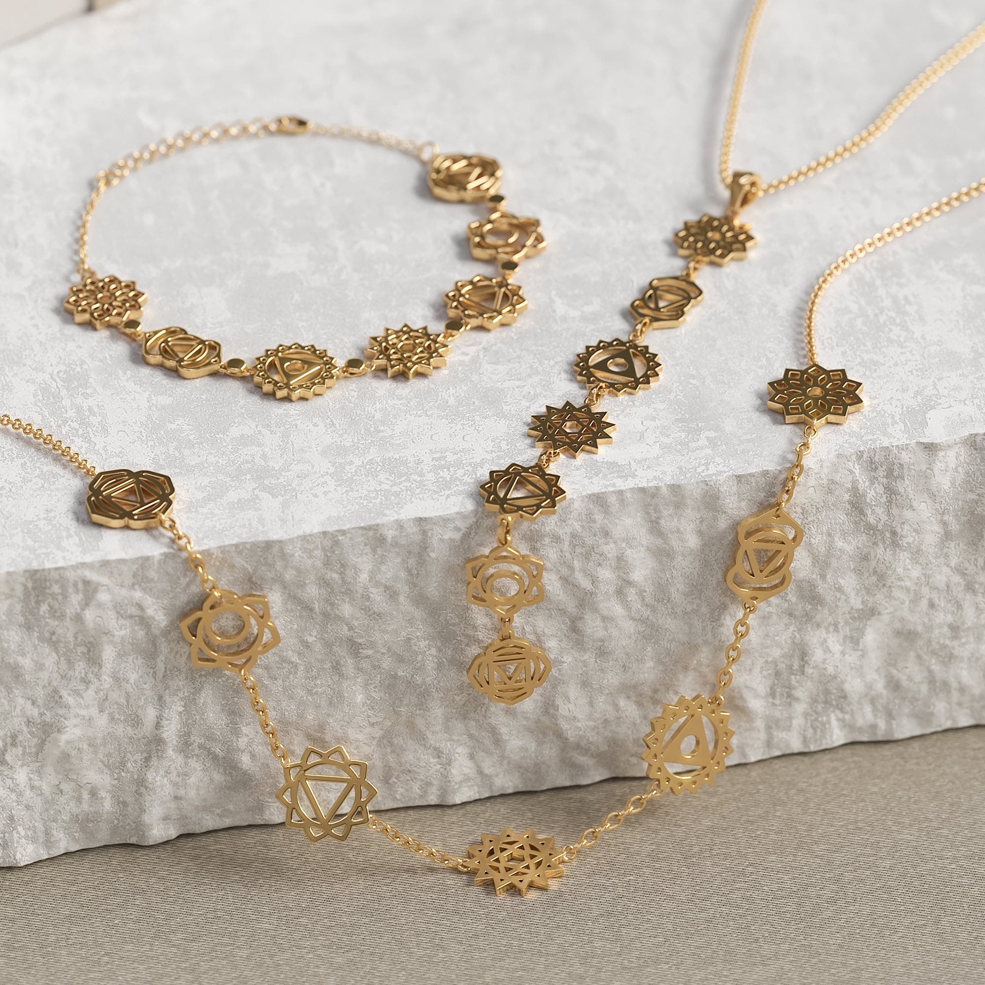 Daya chakra necklaces arranged with handmade spiritual jewelry