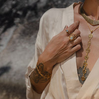 7-Chakra Necklace editorial hero - model white linen